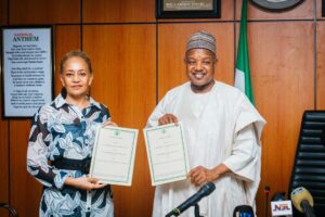 UK Charge d’ Affairs, Ms Cynthia Rowe, and Minister of Budget and Economic Planning, Senator Abubakar Bagudu, during the signing of eight Programme Implementation Agreements between the United Kingdom and Nigeria in Abuja on Thursday 12/09/24 PHOTO: FMBEP