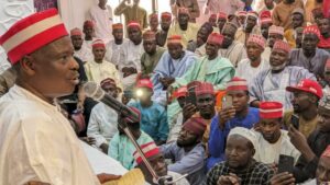 Kwankwaso welcoming the decampees at his Miller Road residence.jpg