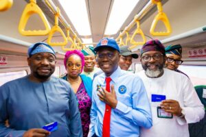 Governor of Lagos State, Mr. Babajide Sanwo-Olu (middle); Committee chairman on Transportation, Lagos State House of Assembly, Hon. Temitope Adewale (right) and some members of the House of Assembly during the flag off of commercial operations of the Redline rail at the Oyingbo Terminal on Tuesday, 15 October 2024.