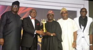 From left:Mr Udeme Ufot, Group Managing Director SO&U;Sir Steve Bamidele Omojafor, Chairman of the occasion presenting award of Excellence to Mr Yinka oyebode, Chief press Secretary to Ekiti state Governor on behalf of the Governor;Mr Lanre Adisa,President AAAN and Mr John Ajayi, Publisher/CEO Marketing Edge publications Ltd. At the 2024 The Edge Awards with the Tittle:Excellence beyond Borders held at Balmora Convention Centre Sheraton hotel Ikeja Lagos last Friday.