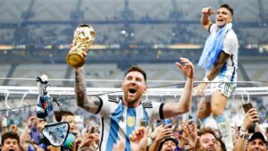 Argentina's Lionel Messi celebrates holding the World Cup after victory in the final in Qatar in 2022. Photo by AP.jpg