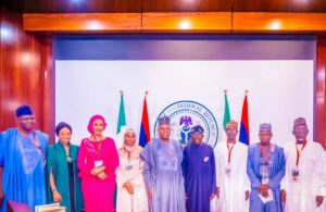 President Tinubu, VP Shettima and the new ministers.jpg