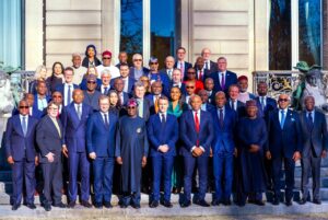 President Tinubu and his team in group photograph with Presiden t Macron and his officials.jpg