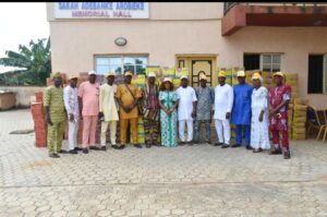 Arobieke and others during the handing over of the essential items