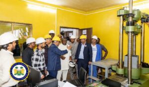 The company officials explaining matters of interest to President Bio