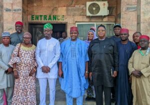 Chief of Staff flanked by members of the delegation.jpg