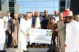 Governor Yusuf being welcomed by the stranded Kano students in Cyprus.jpg