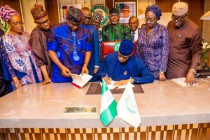 Governor Abiodun signing the 2025 budget.jpg