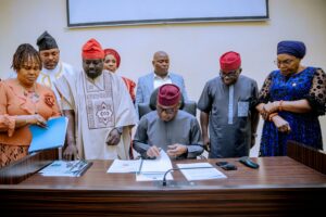 Governor Oyebanji signing the budget.jpg