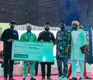 Mr. Seyi Tinubu with the representative from Mathiano, 2nd Place winner of the tech grant of N3m.jpg