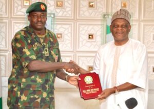 Major General Emmanuel Ndagi presenting a plaque to TETFUND’s Executive Secretary, Arc. Sonny Echono during the visit.