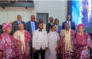 Tobiloba, Ayodele, their parents and RCCG officiating ministers.jpg