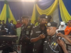 CP Dogo decorating one of the newly promoted officers