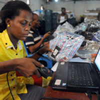 A Jumia worker scans a product at a warehouse in Lagos. Credit:AFP