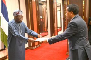 President Tinubu receing letter of credence from one of the High Commissioners