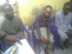 The three kidnappers who abducted and killed retired Gombe Permanent Secretary after collecting ransom being paraded at the Bompai police headquarters, Kano, on Monday