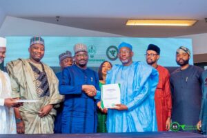 Governor Namadi and the management team of REA after signing the MOU