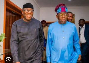 President Bola Tinubu, right, and Dr Kayode Fayemi