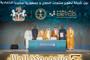 Senator Ibrahim Hassan Hadejia and others at the signing ceremony