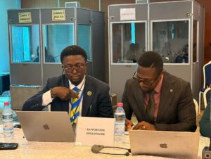 SLPHA Company Secretary, Martin Maada George, left, brainstorming at the ongoing PMACA meetings in Cotonou, Benin