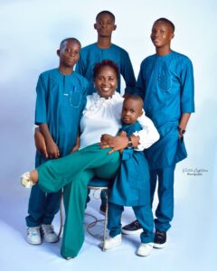 Mrs. Oyindamola McJohn and the children
