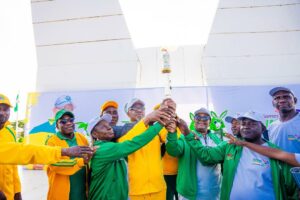 Abiodun received the Torsh from Dorcas Adesokan, winner of two gold medals at the 2014 African Youth Games and Women's Singles and Doubles Champion
