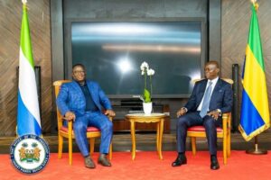 Bio, left, with Nguema, holding talks