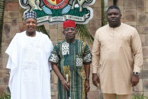 From left, Senator Bagudu, Governor Otti and another official