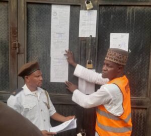 Officials of Kano state Ministry of Environment sealing the insecticide warehouses