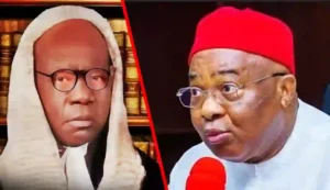 The late Justice Justice Emmanuel Obioma Ogwuegbu, left, and Governor Hope-Uzodimma