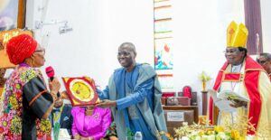 Wife of former Diocesan, Mrs. Oluranti Ademowo presenting a commemorative plate to Governor of Lagos State, Mr. Babajide Sanwo-Olu, with them is the Diocesan Bishop of Lagos, Anglican Communion, Rt. Rev'd. Ifedola Okupevi, during the first session of the 36th Synod of the Diocese of Lagos at Our Saviour Church, Tafawa Balewa Square (TBS), Lagos, on Monday, 05 May, 2025.