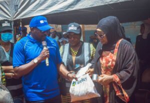L-R: Branch Leader, Minna, Fidelity Bank Plc, Mustapha Abubakar; Her Excellency, First Lady of Niger State, Hajiya Fatima Umaru Bago; and the CEO, ABBASID (a Fidelity Food Bank partner), Hajiya Hauwa Abbas; at the Fidelity Food Bank Distribution in Mokwa, Niger State recently.