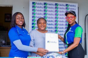 L-R: Member, Nexus 2025 Inductee Class, Grace Bamigboje; Caregiver, Old People’s Home, Mrs Kebbi Orinowu; and Products Marketing Partner, Fidelity Bank Plc, Tolulope Rojaiye; at the Fidelity Helping Hands Programme Donation to Old People’s Home, Yaba, Lagos State recently.