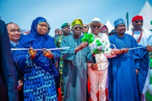 President Tinubu commissioning one of the FCT projects. To his left is Wike