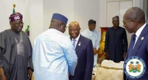 President Bio shaking hands with Liberia’s President Boakai, while President Tinubu, others, look on