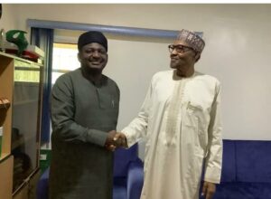 File photo. Femi Adesina and Muhammadu Buhari