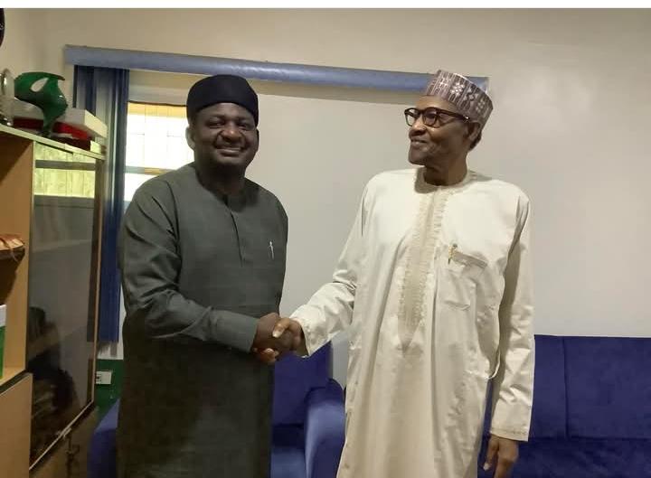 File photo. Femi Adesina and Muhammadu Buhari