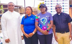 L-R: Church Administrator, St. Patrick Catholic Church, Ado-Ekiti, Reverend Benedict Joseph; The Branch Leader, Fidelity Bank Plc, Ado-Ekiti, Mrs. Ikeolu Akinropo; Team Lead CSR, Fidelity Bank Plc, Victoria Abuka; and Fidelity Food Bank Partner, Reverend Michael Domingo, at the Fidelity Food Bank distribution event held in Ekiti recently