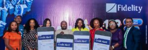 L-R: Regional Bank Head, Lagos Central, Fidelity Bank Plc, Chioma Nwankwo; Divisional Head, Product Development, Fidelity Bank Plc, Osita Ede; Principal Legal Officer, Lagos State Lottery and Gaming Authority, Oyinkan Kusamotu; Winners of the 4th, 5th and 6th monthly draws of the Get Alert in Millions (GAIM) 6 Promo - Stephanie Onome Gere, Itua Michael Ehinomen, Maduabuchi Kalu Anya, and Chioma Grace Nnodim; South-West Zonal Coordinator, Federal Competition and Consumer Protection Council (FCCPC), Aboluwade Margaret; and Group Head, Savings and Retail Sales, Fidelity Bank Plc, Oladimeji Saka; during the prize presentation ceremony for the winners of the 4th, 5th and 6th monthly draws of the Fidelity Bank GAIM 6 promo held in Lagos recently