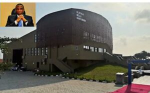 Olaunji Bello (inset) and the audtorium he built in LASU