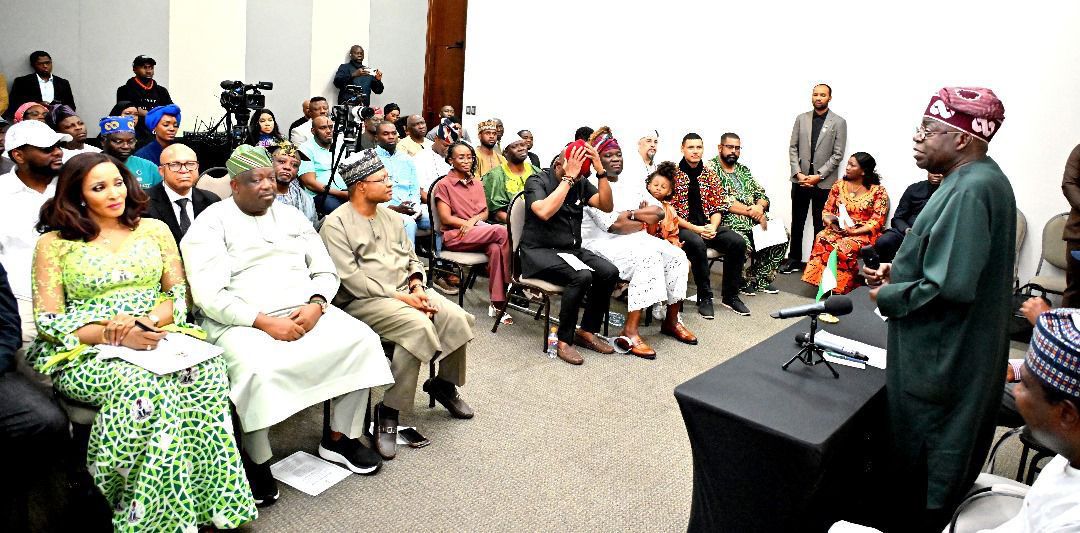President Tinubu with a cross section of Nigerians resident in Brazil
