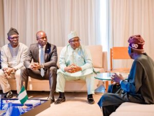 President Tinubu, right, SEC Director-General, Dr. Emomotimi Agama, President Bola Tinubu and NGX Group Chairman, Alhaji Umaru Kwairanga and another official