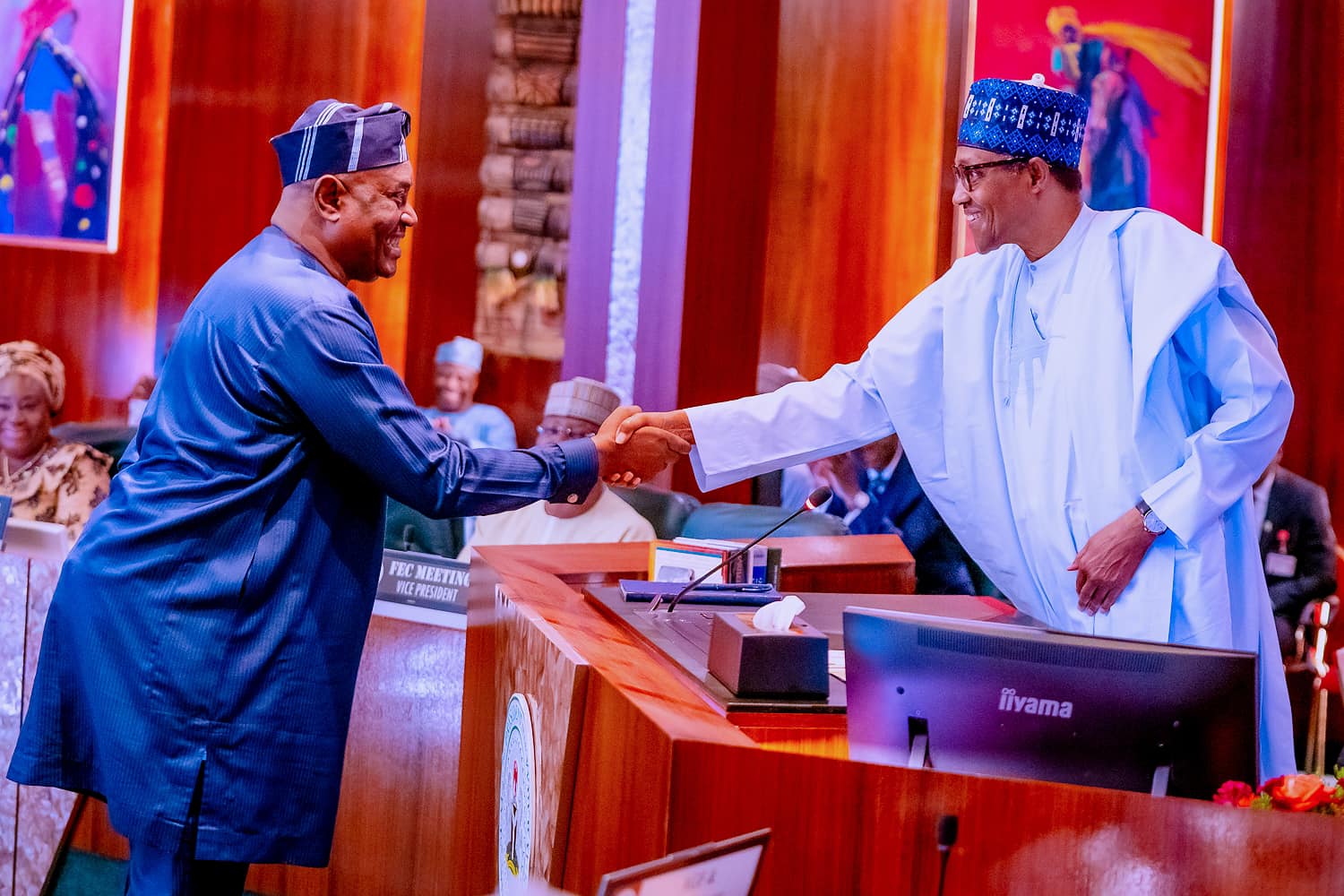 Former President Muhammadu Buhari and Solomon Arase