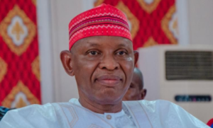Governor Yusuf reading a document2