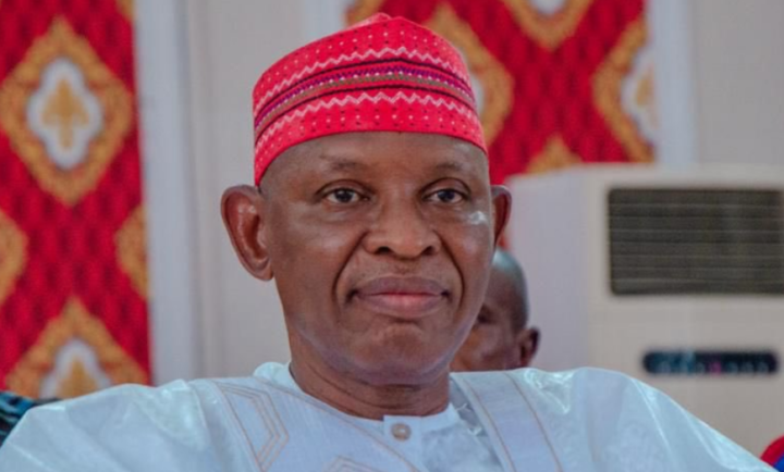 Governor Yusuf reading a document2