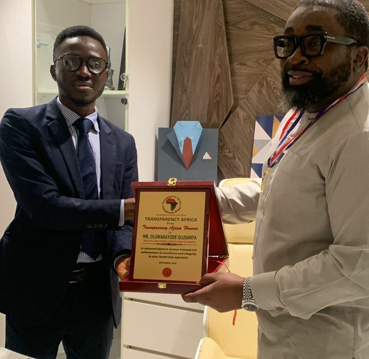 Oak Holdings CEO, Olukayode Olusanya receiving his award