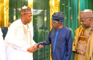 President Tinubu shaking hands with Governor Sulum of Borno State
