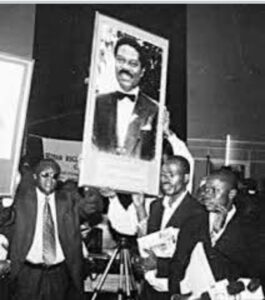 Fawehinmi and other human rights activists carrying Giwa's placard