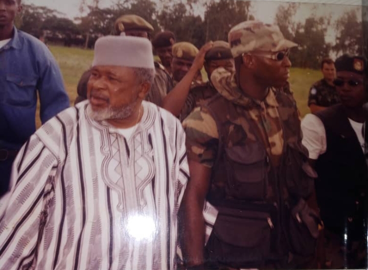 Rebel leader, late Foday Sankoh, on the left, with some of his rebel fighters, about to embark onto the helicopter to negotiate peace in the region