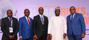 L-R: Registrar/CEO, Chartered Risk Management Institute of Nigeria (CRMI), Victor Olannye; Permanent Secretary, Special Duties, Federal Ministry of Finance, Raymond Omachi; Executive Director/Chief Risk Officer, Fidelity Bank Plc and President/Chairman of Council, CRMI, Kevin Ugwuoke; Technical Adviser to the President on Economic and Financial Inclusion, Nurudeen Abubakar Zauro; and Director, Risk Management, Central Bank of Nigeria (CBN), Blaise Ijebor; at the CRMI 24th Annual International Conference in Lagos recently.